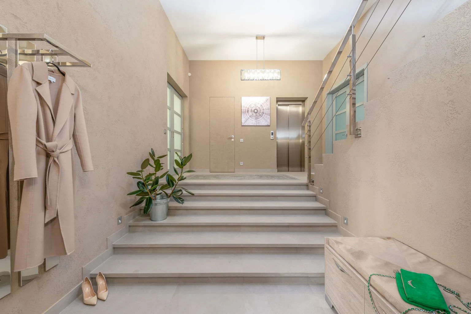 Lobby of a contemporary apartment building in beige tones