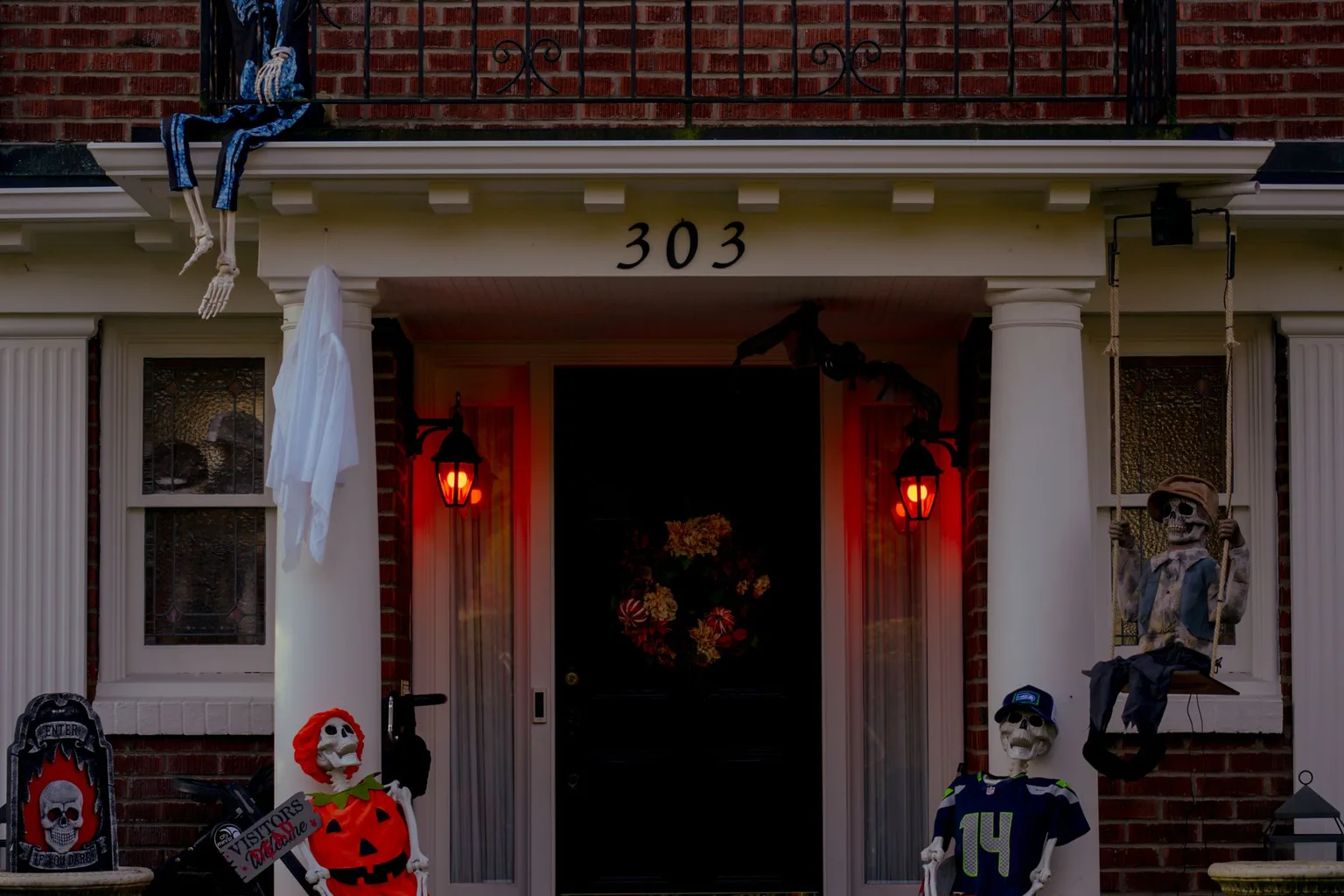 Halloween decorations displayed in front of a house
